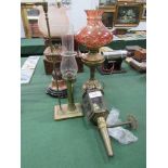 Copper oil lamp, 2 brass oil lamps & a brass wall mounted oil lamp. Estimate £30-50