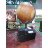 Hardwood 'Globe' on stand. Estimate £10-20