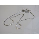 18ct white gold flat necklace, weight 8.7gms, length 54cms. Estimate £200-220