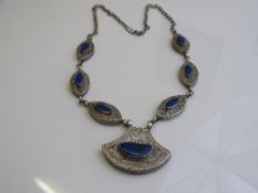 Silver coloured metal & blue stone Indian-style necklace, length 40cms. Estimate £30-50.