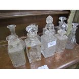 9 various decanters, some without stoppers. Estimate £20-30