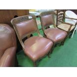 2 oak framed brown leather upholstered side chairs. Estimate £20-30