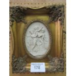 Gilt framed wall plaque of children, initials & date 1882, Saint Petersburg on reverse. Estimate £