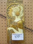 A pair of decorative wall plaques with female figures. Estimate £10-20