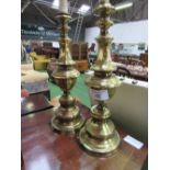 A pair of tall brass table lamps, height 53cms. Estimate £20-40