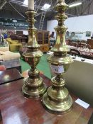 A pair of tall brass table lamps, height 53cms. Estimate £20-40