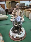 Capodimonte figurine of a blacksmith making a sword. Estimate £20-30