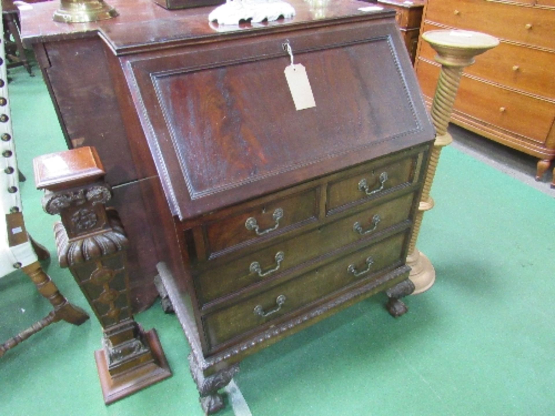 Mahogany bureau with 2 over 2 drawers, gadroon to ball & claw feet. Estimate £20-40