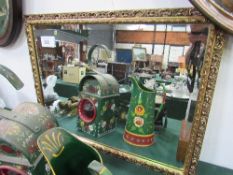 Ornate gilt framed bevel edge mirror, 60cms x 45cms. Estimate £10-20