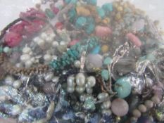 Bag of costume jewellery, many with semi-precious stones. Estimate £20-30