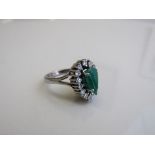 18ct white gold ring set with a pear shaped cloudy emerald & 14 diamonds, size K 1/2, weight 8.6gms.