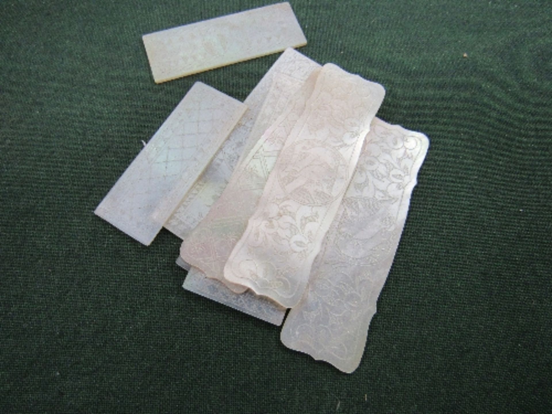 8 pieces of oyster shell, Georgian/Victorian gaming tokens. Estimate £20-30