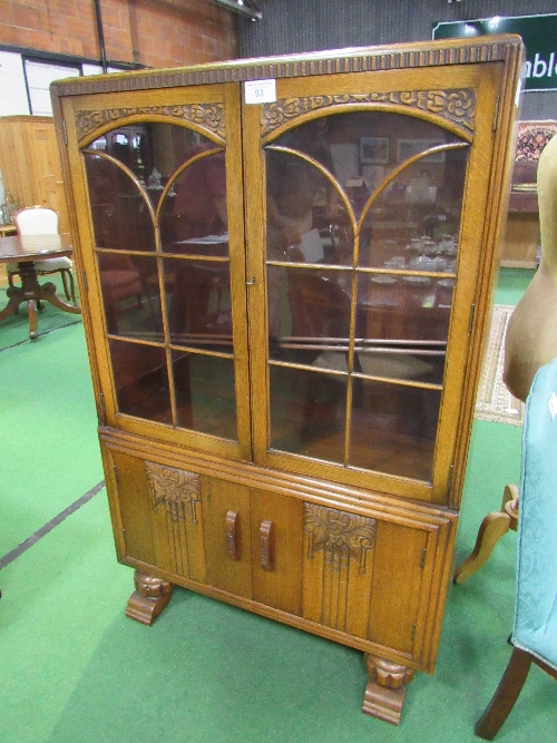 Oak 1920's style glazed bookcase over cabinet