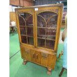 Oak 1920's style glazed bookcase over cabinet