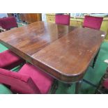 Edwardian extendable mahogany dining table on tapered fluted legs to brass casters, 180cms (