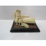 19th century Dieppe-style carved ivory figurine of herdsman on a log playing his flute with a goat