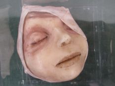 French anatomical wax death mask of a one eyed toddler. Estimate £90-120