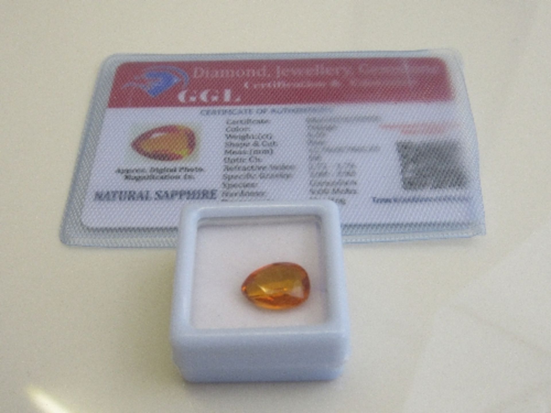 Natural pear cut loose sapphire, weight 6.20 carat, with certificate. Estimate £50-70.