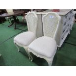 2 French-style cream coloured cane back bedroom chairs together with cream coloured cane double