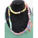 African trade bead necklace. Estimate £35-55