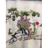 Chinese silk embroidery of 2 peacocks.  Estimate £15-25