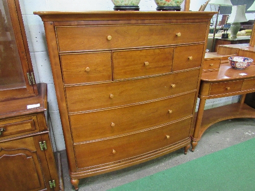 Cherry wood bow front chest of 7 graduated drawers by Willis & Gambier, 120cms x 54cms x 116cms.