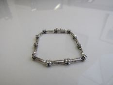 14ct white gold, diamond & sapphire bracelet, weight 8gms. Estimate £500-550