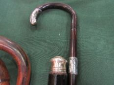 Curved Charlie Chaplin cane stick & ebony stick with hallmarked silver mounts. Estimate £25-30