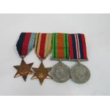 WWII medal group on bar includes The Africa Star set of 4 medals, all original. Estimate £40-60