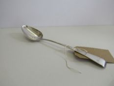 Georgian silver serving spoon, London 1799, weight 3.6oz, length 30cms. Estimate £40-60