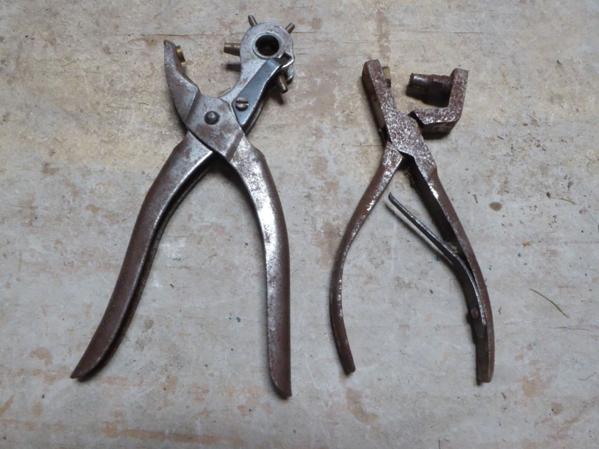 Leather hole punch and a press