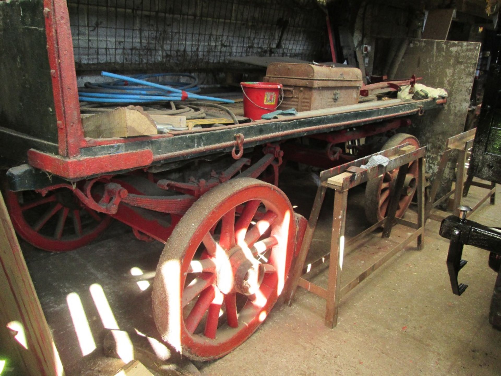 Flat Bed Trolley, painted black with a red undercarriage. Measures 12ft long x 6ft wide