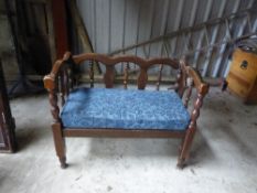 wooden 2 seat bench with blue cushion