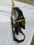 New black patent leather Shire bridle by S.B. Saddlers complete with a clincher brow band, face