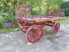 Agricultural Trolley painted dark red and lined in yellow. On 37ins/40ins iron shod Warner wheels