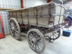 Miller's Farm Wagon in original condition of varnished natural wood and faintly marked Hintwood,