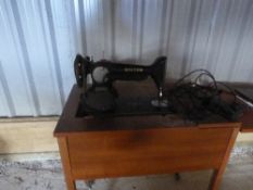 Electric Singer sewing machine, No.K596085 complete with table