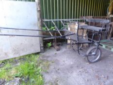 Exercise Cart by Hillam, painted black on pneumatic tyres and wire wheels. With shafts