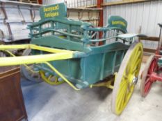 Market Float to suit 14 to 16 hh; the body is painted green with spindles above the side panels