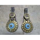 Pair of leather headpieces each with a light blue ceramic centred horse brass