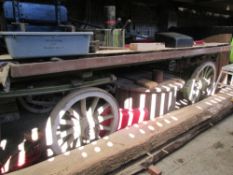 Flat Bed Trolley, painted green with cream lines. On English pattern iron shod wheels and fitted