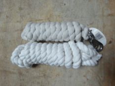 Two white lead ropes with whitemetal catches