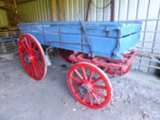 Wiltshire Market Cart painted with a blue body on a red undercarriage. On 33ins/47ins iron shod