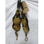Pair of kidney straps each with two horse brasses