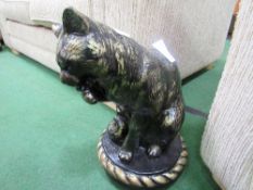 2 black & gilt painted stone-effect cat figures. Estimate £40-60