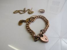 Rolled gold bracelet; gold coloured watch chain; pair of gold coloured cufflinks & a gold coloured &
