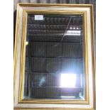 Gilt framed bevel edged wall mirror, 82cms x 58cms. Estimate £20-30