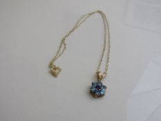 9ct gold, purple & pale blue stone flower pendant on 9ct gold chain, weight 1.9gms. Estimate £20-30