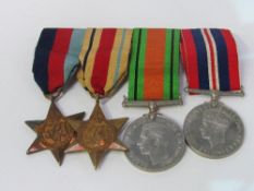 WWII medal set on bar, including The Africa Star. Estimate £35-45