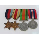 WWII medal set on bar, including The Africa Star. Estimate £35-45